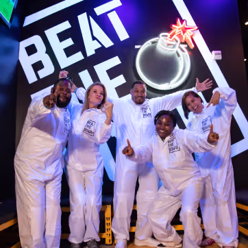 People posing for a photo at Beat the Bomb